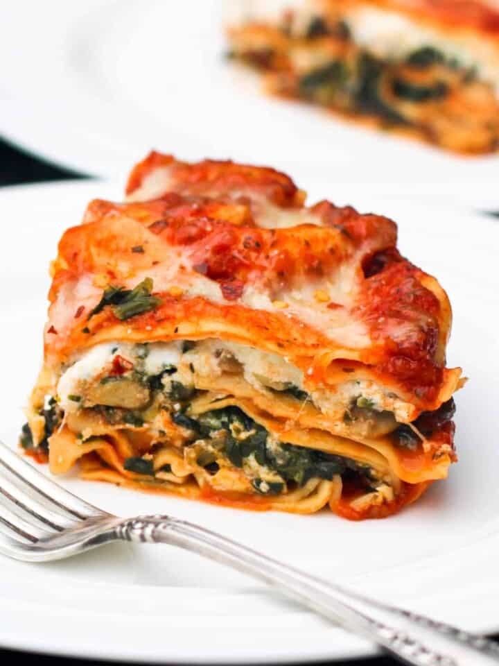 Lasagna served in a white plate