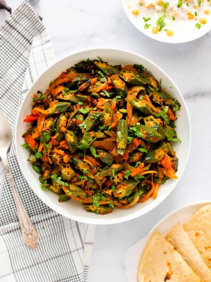 bhindi masala served with roti and raita