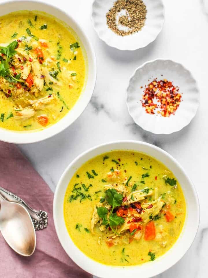 chicken mulligatawny soup served in 2 bowls