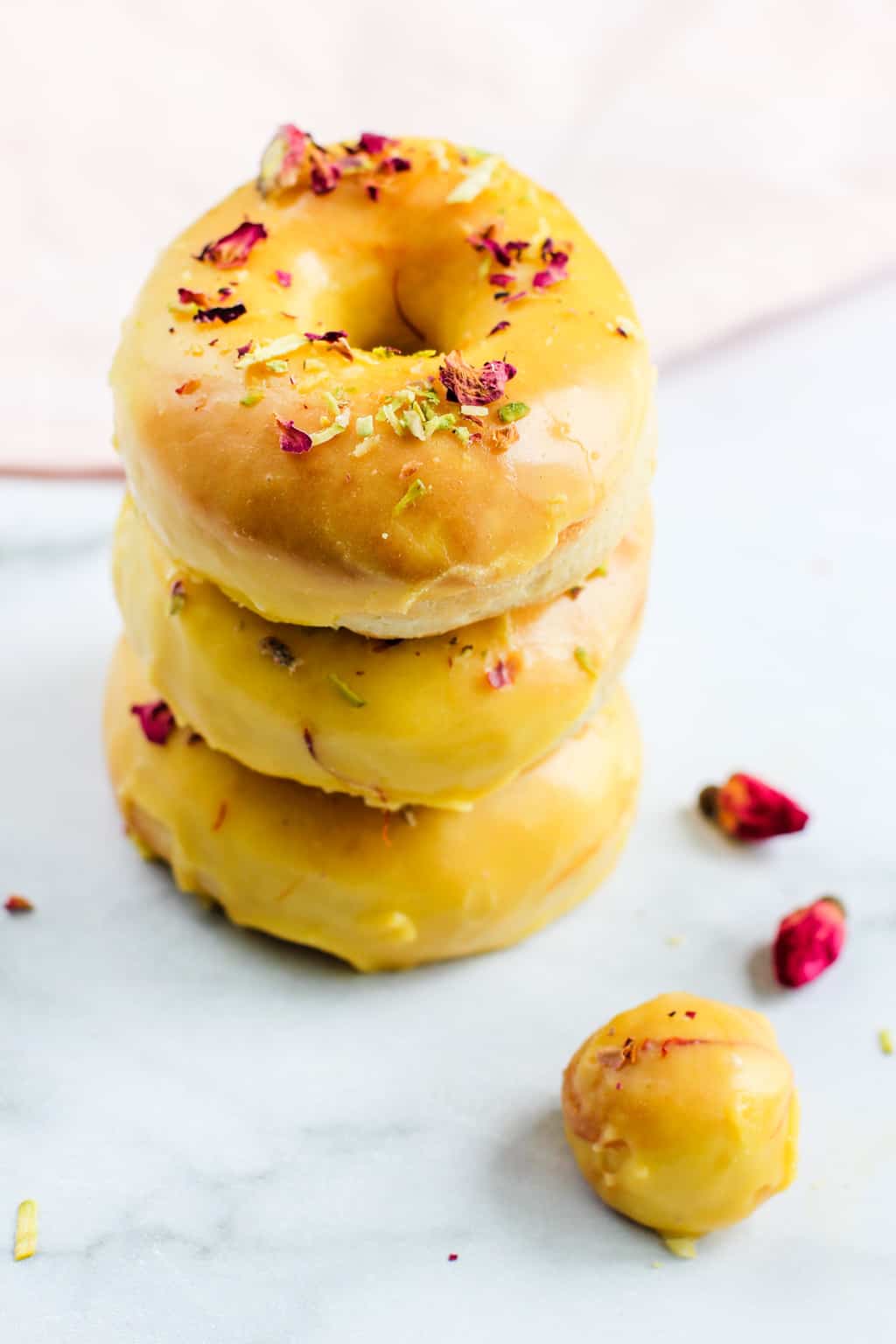 cardamom donuts with saffron glaze