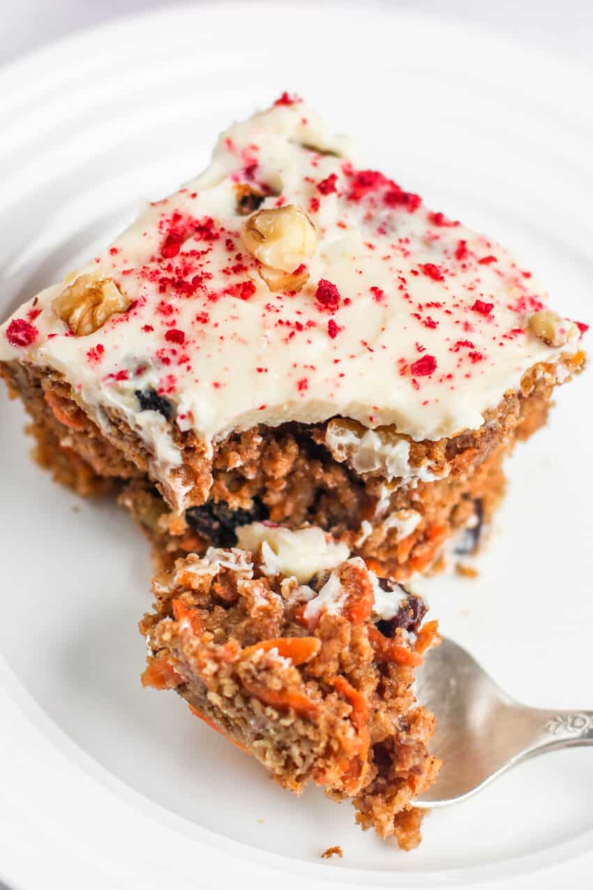 slice of carrot cake and a spoon 