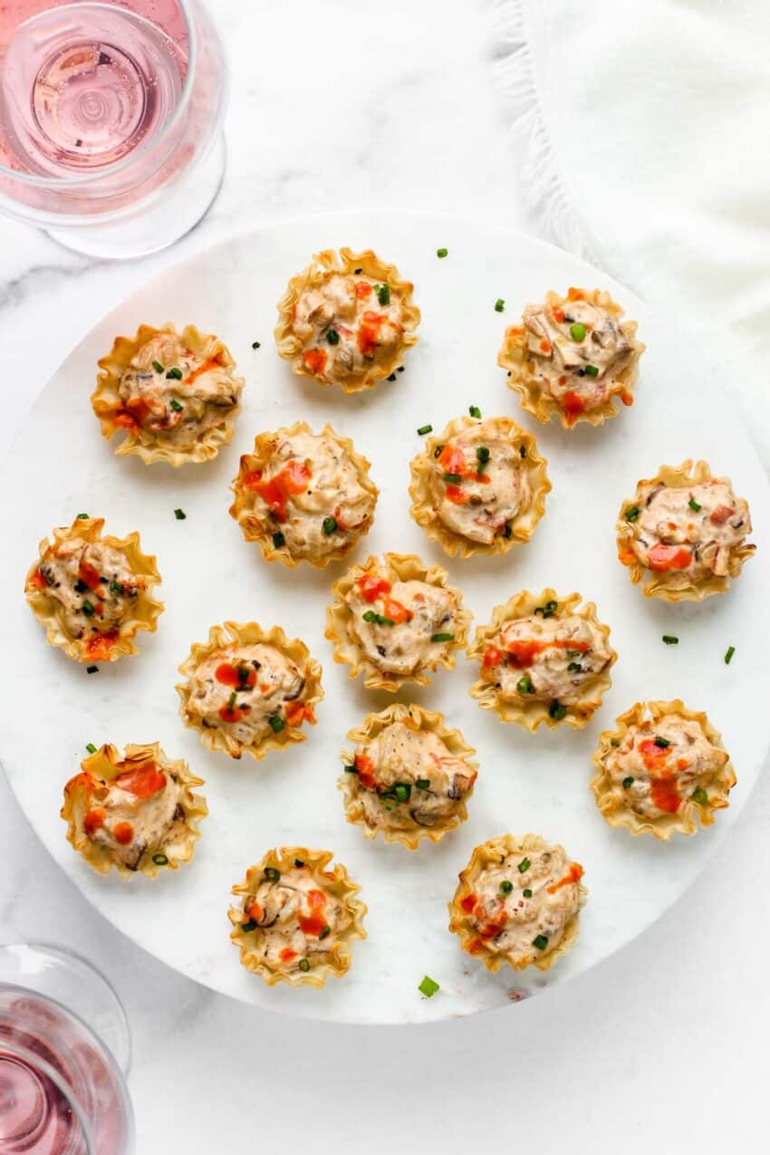 mushroom tartlets with a glass of rose 