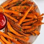 sweet potato fries served with ketchup