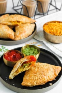 jalapeno cheese samosas with ketchup and chutney