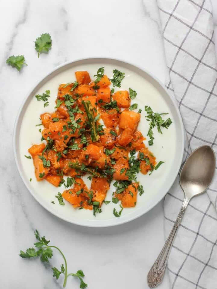 Pumpkin raita in a white bowl