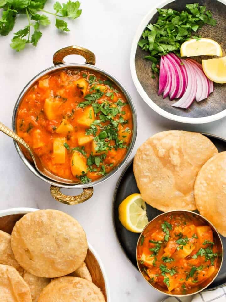 aloo rasedar served with puri