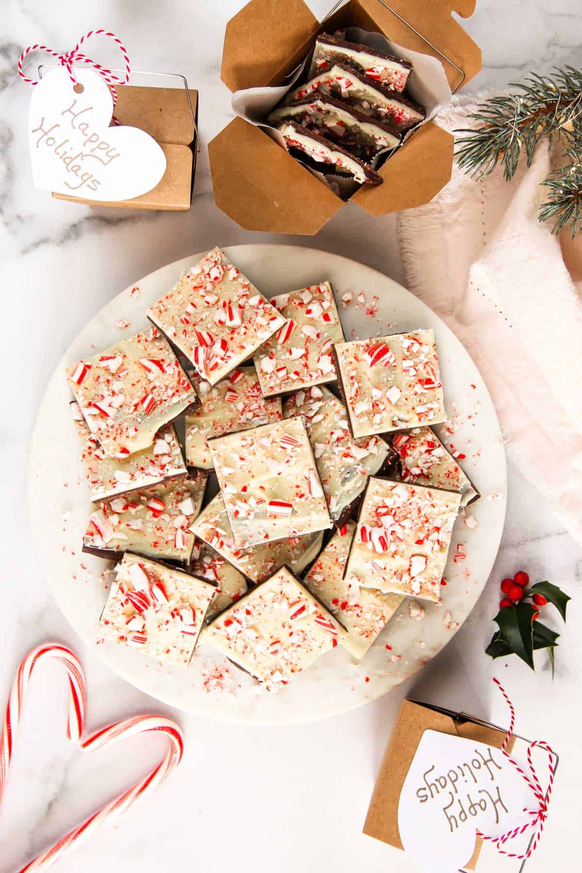 peppermint bark on a marble board and in gift boxes  