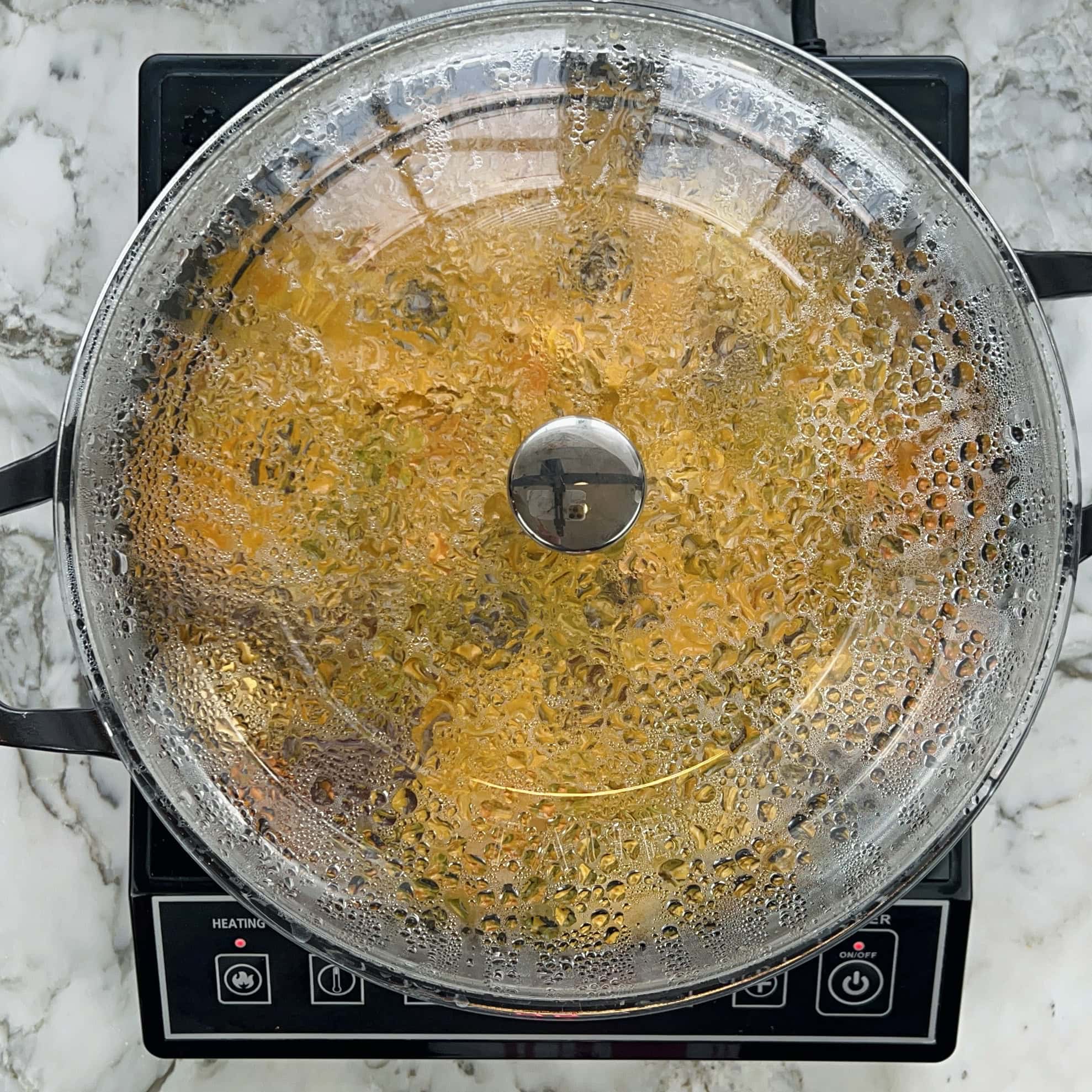 cooking the veggies covered.