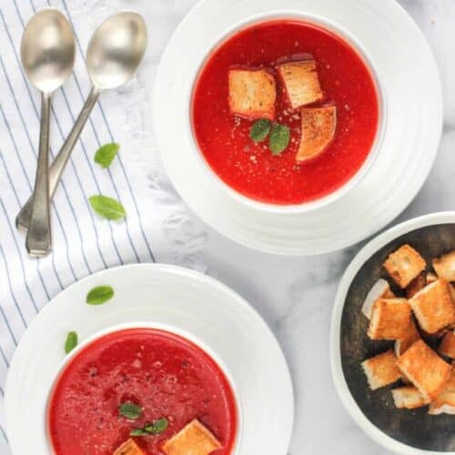 tomato beet soup served with croutons