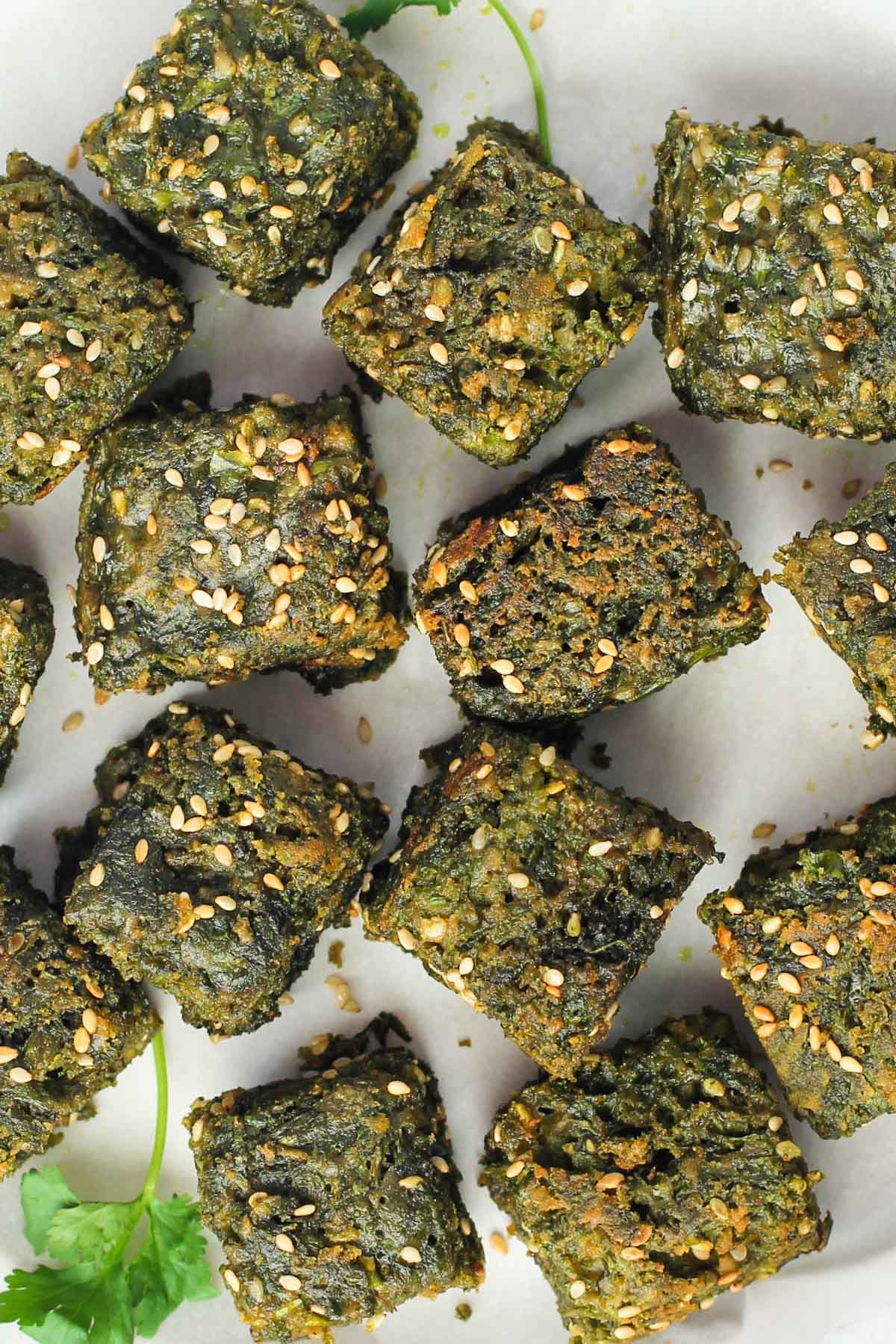 Kothimbir Vadi garnished with sesame seeds