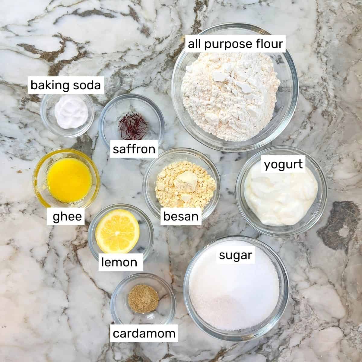 ingredients to make jalebi in individual bowls 