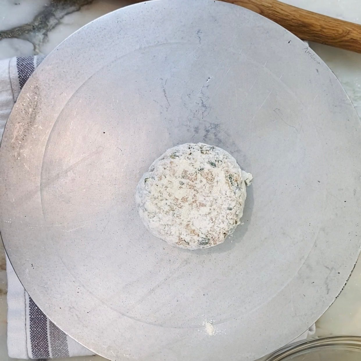 dough ball coated with dry flour. 