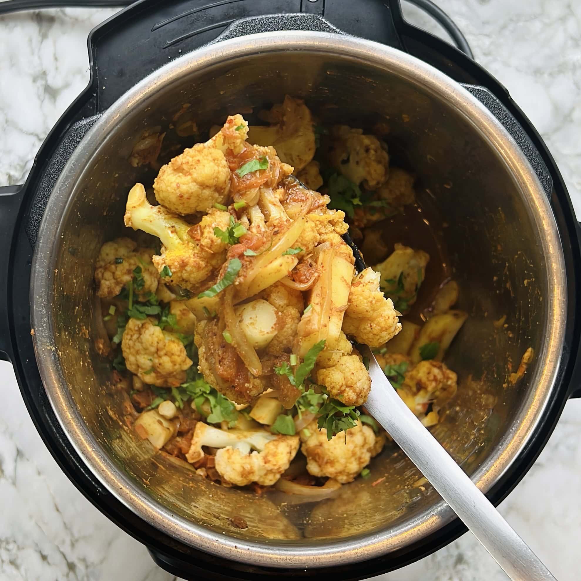 aloo gobi scooped up.