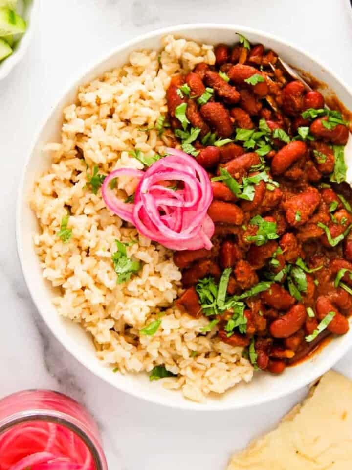 Rajma curry served with brown rice and pickled onions