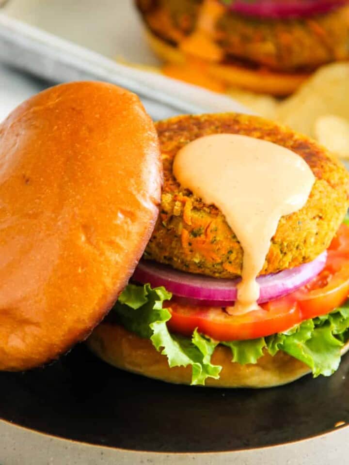 veggie chana burger served with sriracha mayo