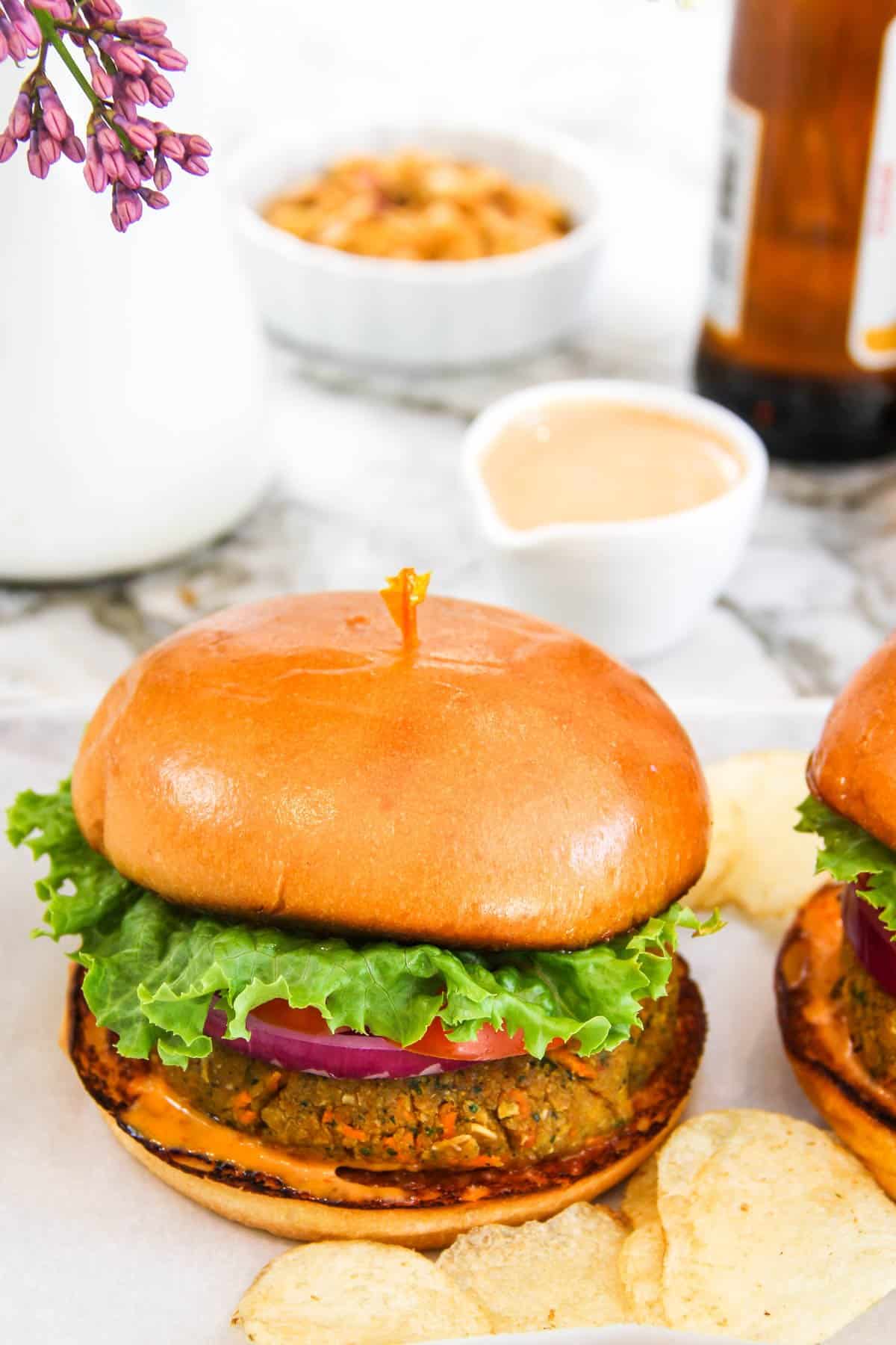 masala chickpea burger served with chips 