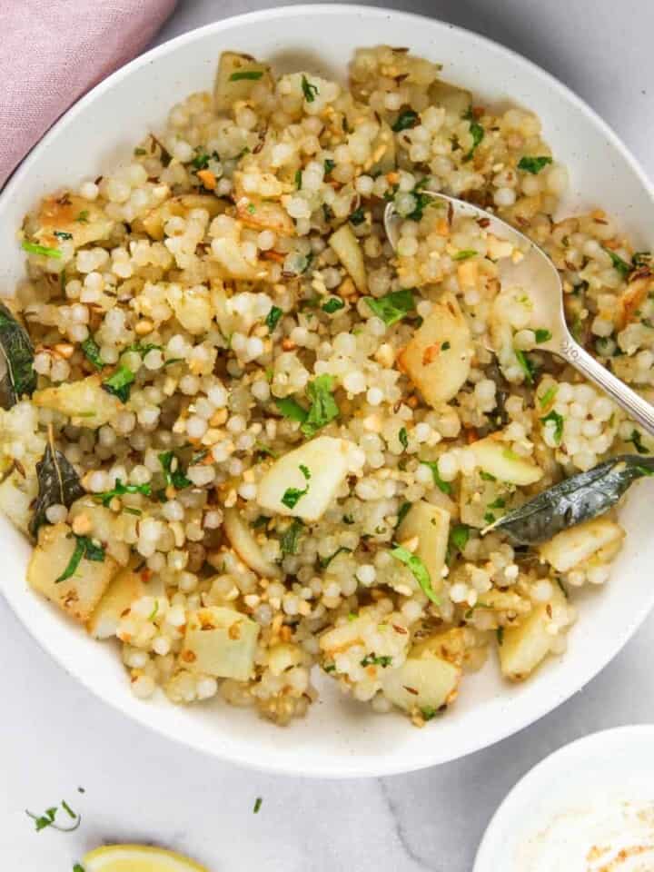 sabudana khichdi in a white bowl