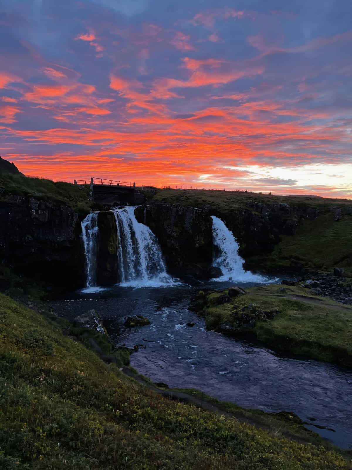 sunset at  Kirkjufellsfoss waterfall in Iceland 