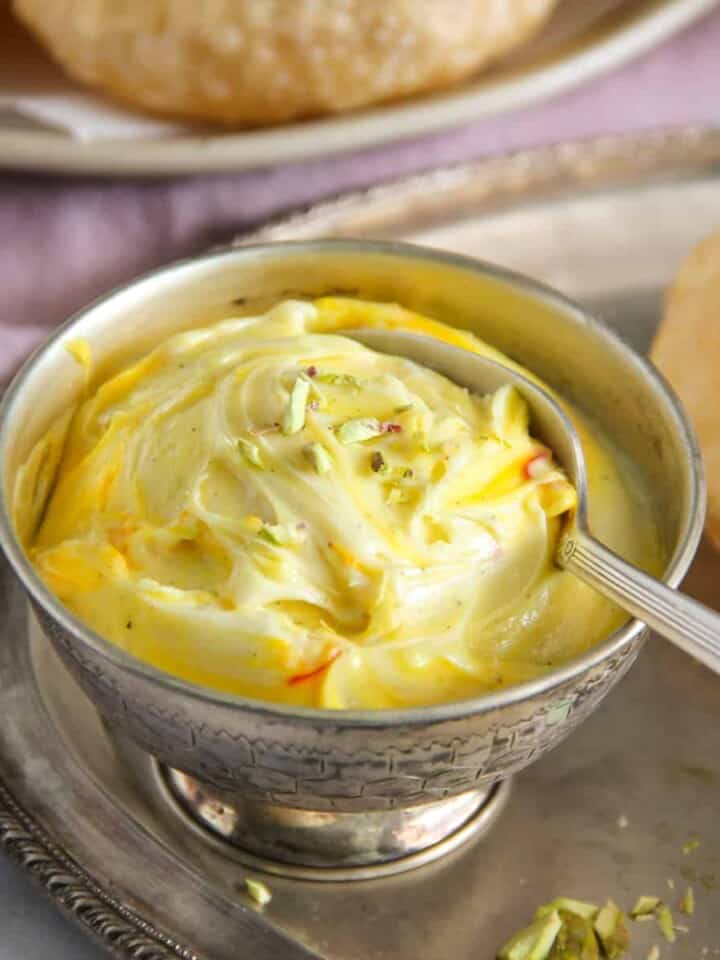 Shrikhand in a silver bowl