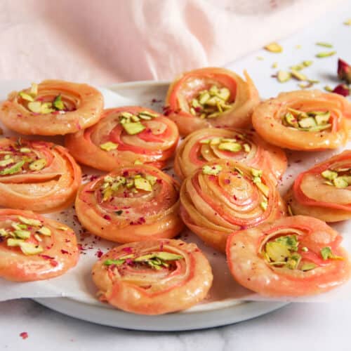 chirote garnished with pistachios in a platter