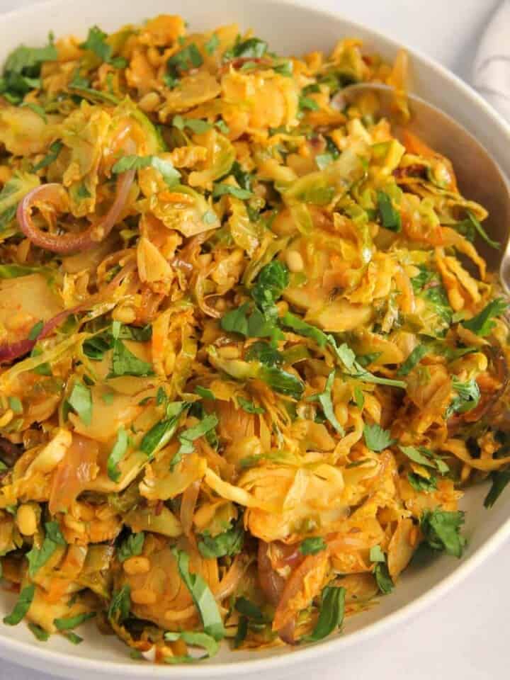 brussels sprouts sabzi in a white bowl