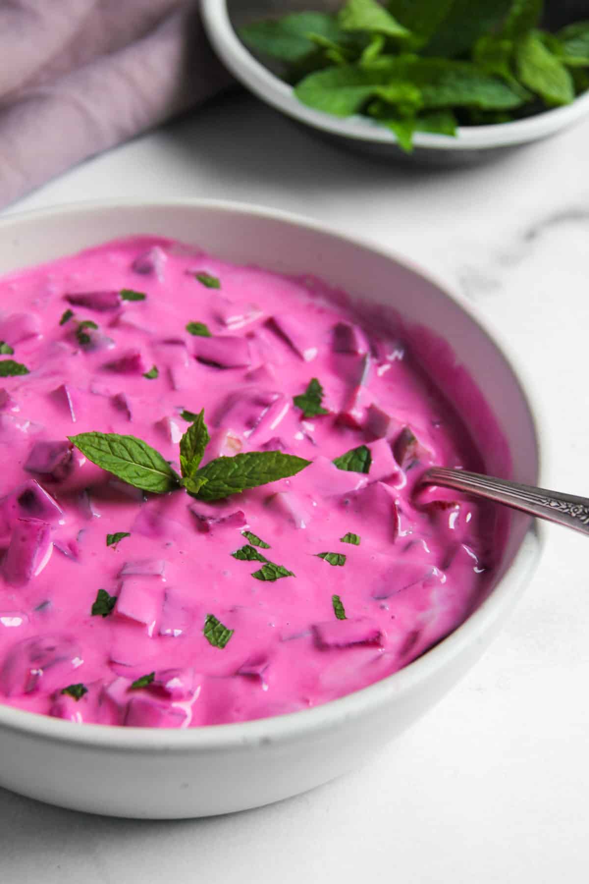 beet raita garnished with mint