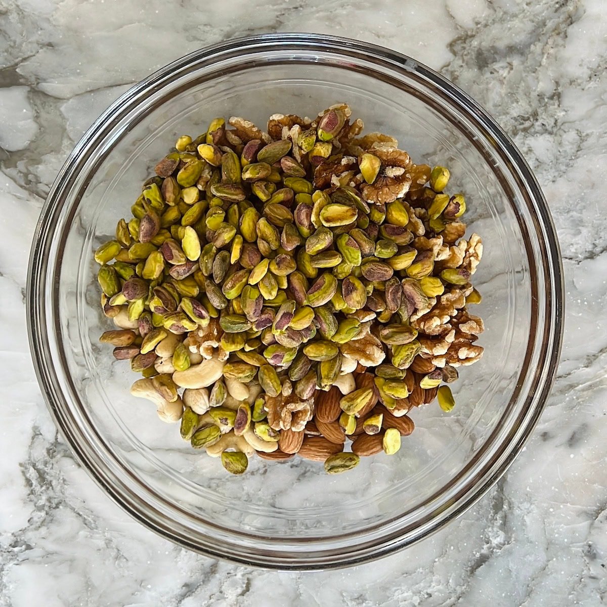 mixed nuts in glass bowl