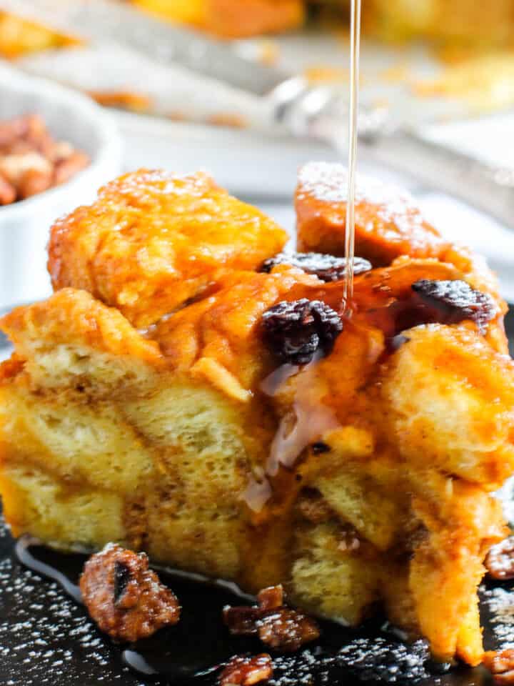 pumpkin bread pudding drizzled with maple syrup