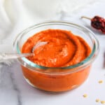 red dosa chutney in a glass bowl