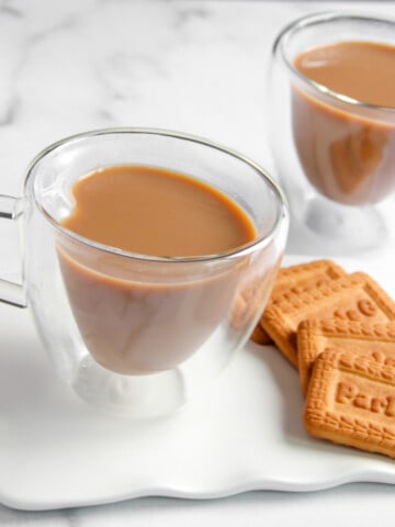 masala chai served with biscuits