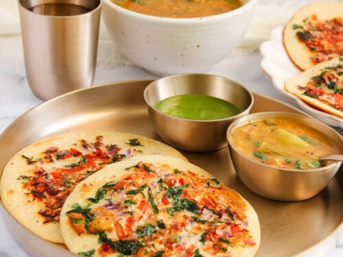 Instant uttapam sserved with sambar and chutney