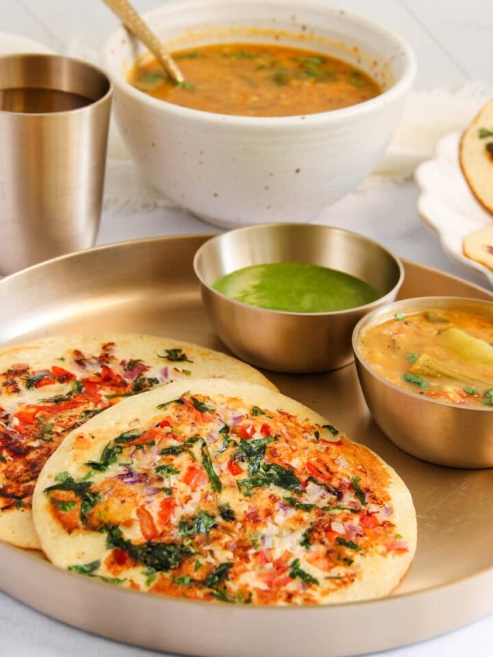 Instant uttapam sserved with sambar and chutney