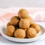 sattu laddu stacked in a platter.