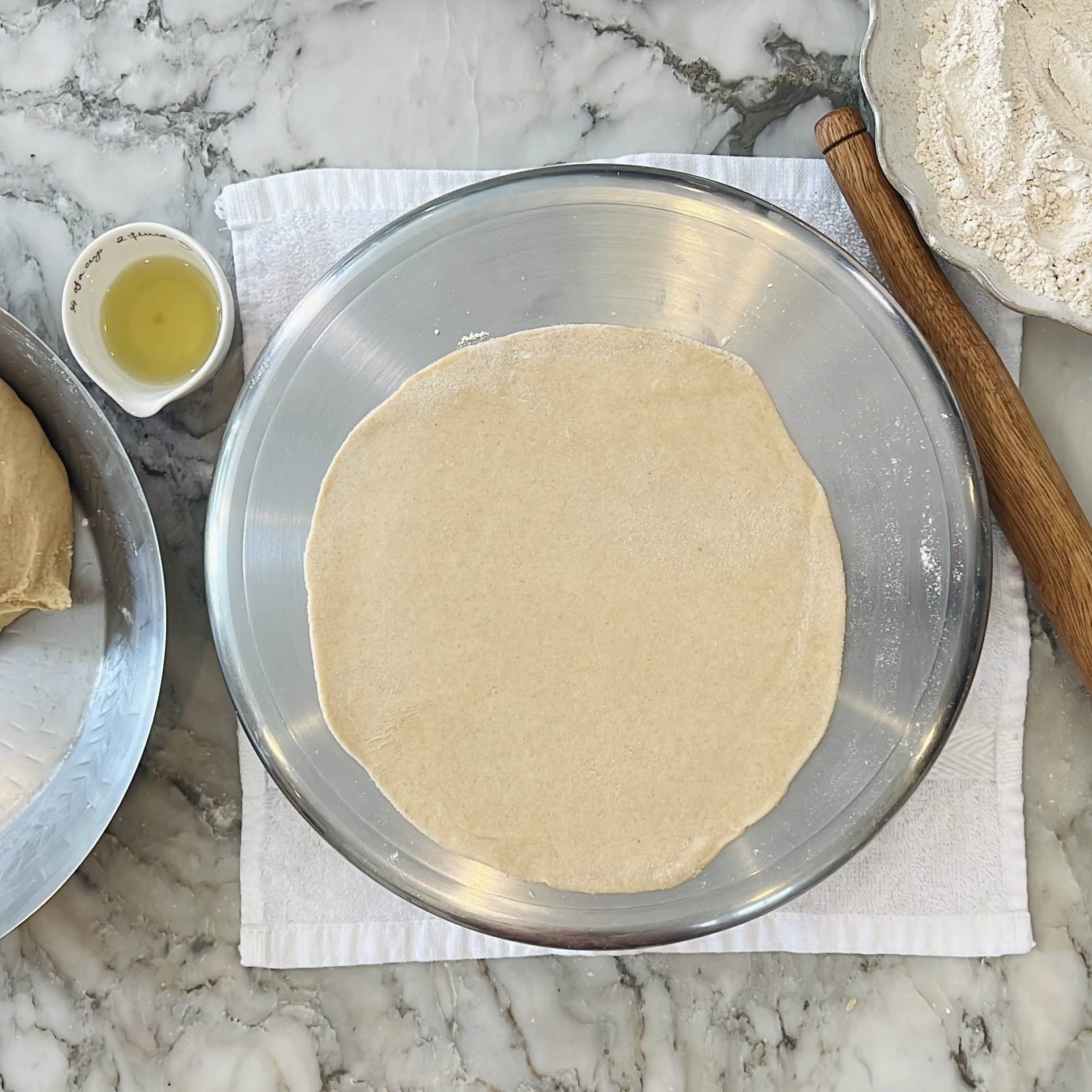 rolled chapati on a roling chakla.