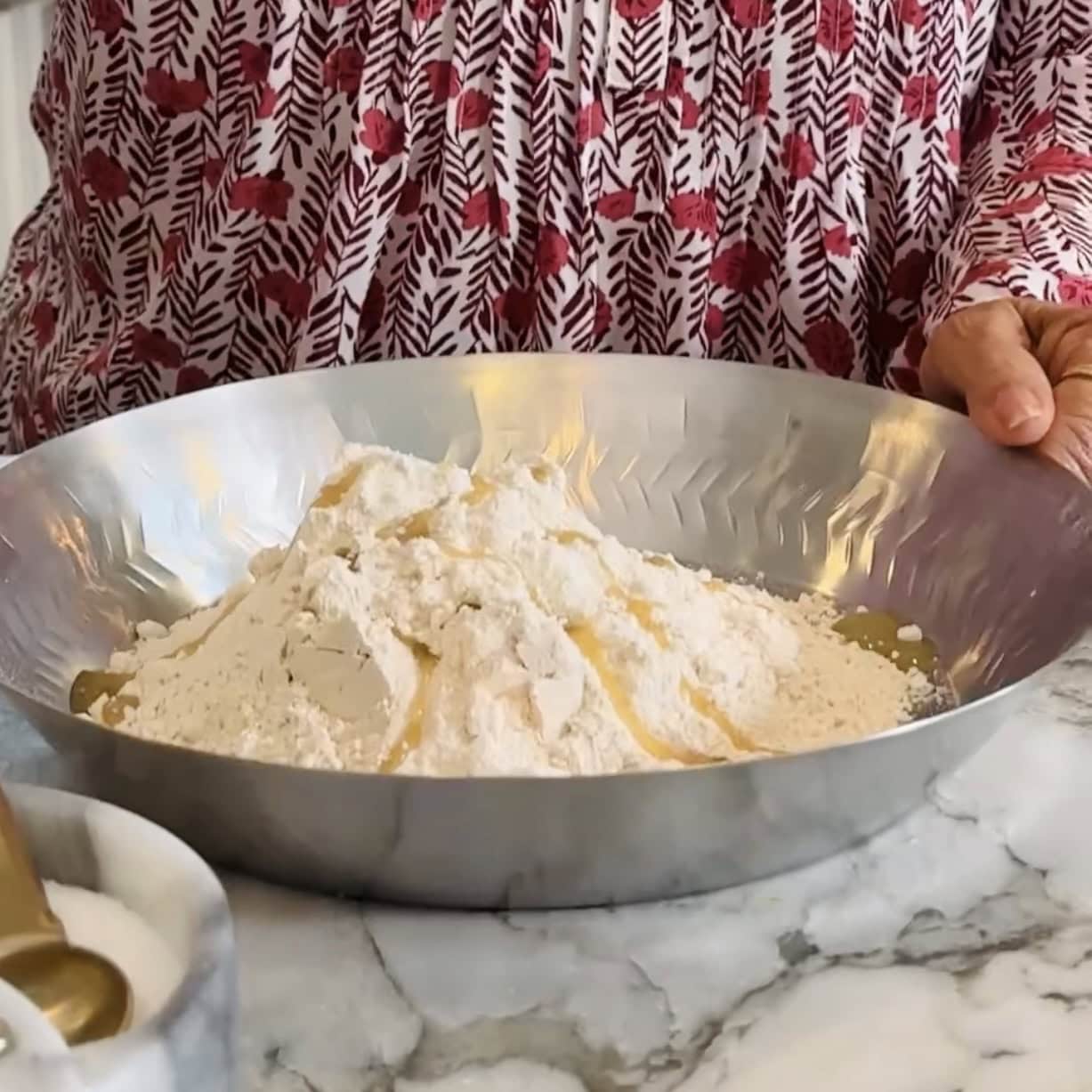 flour, oil and salt in a mixing plate.