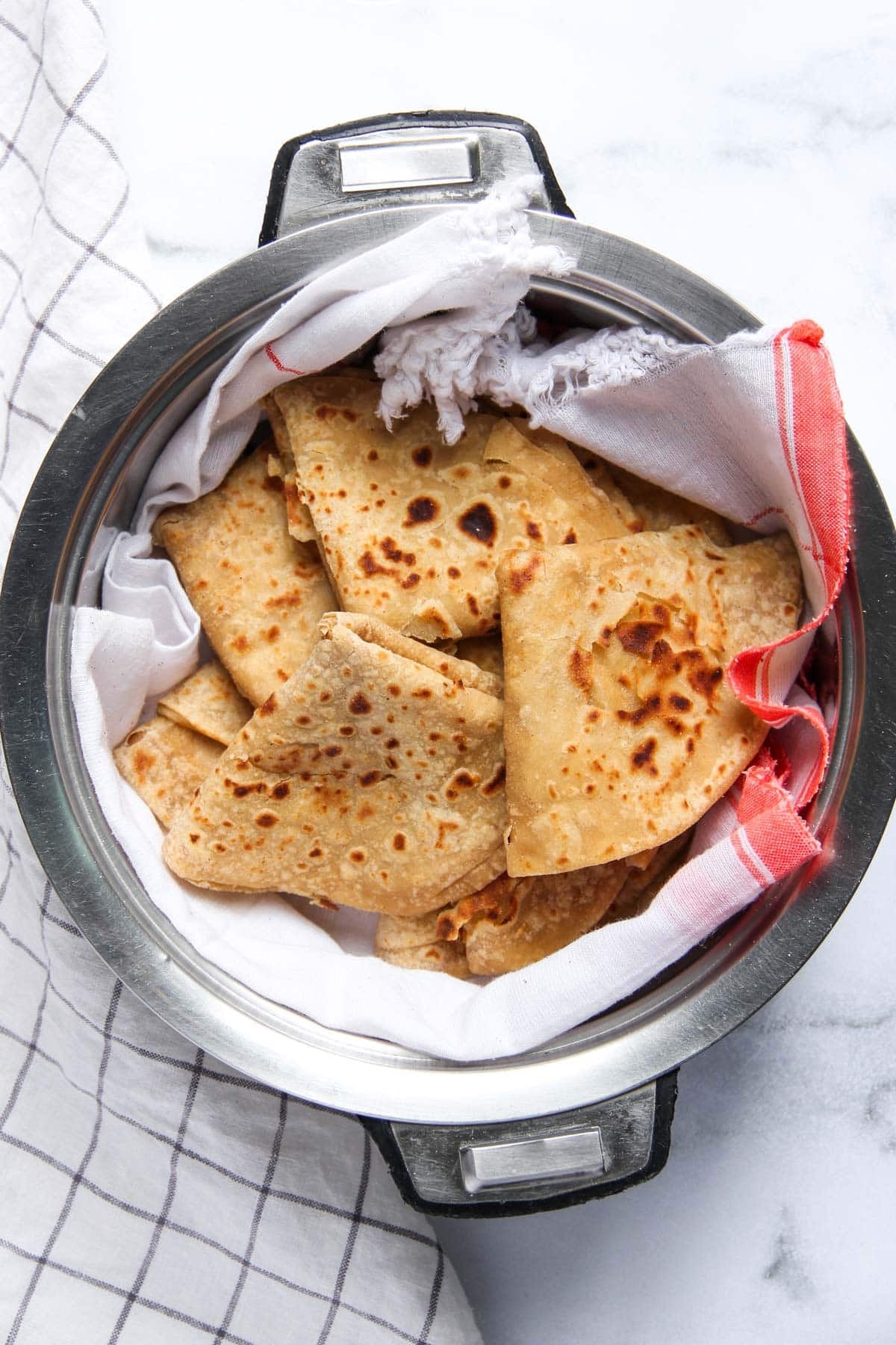 folded chapati's in a casserole.