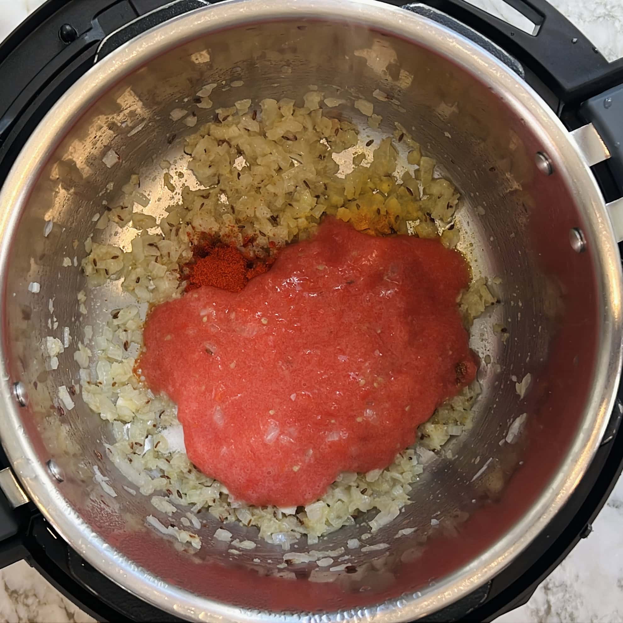 pureed tomatoes in the Instant Pot.
