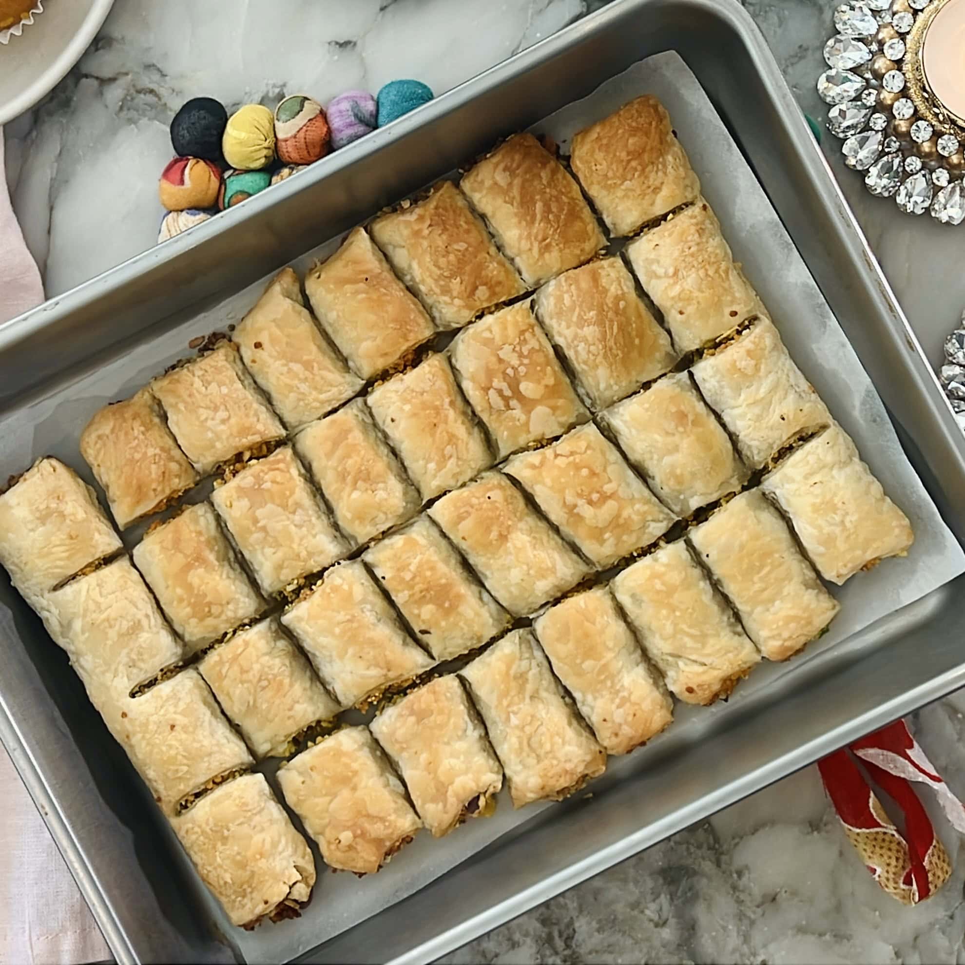 bakes puff pastry squares.