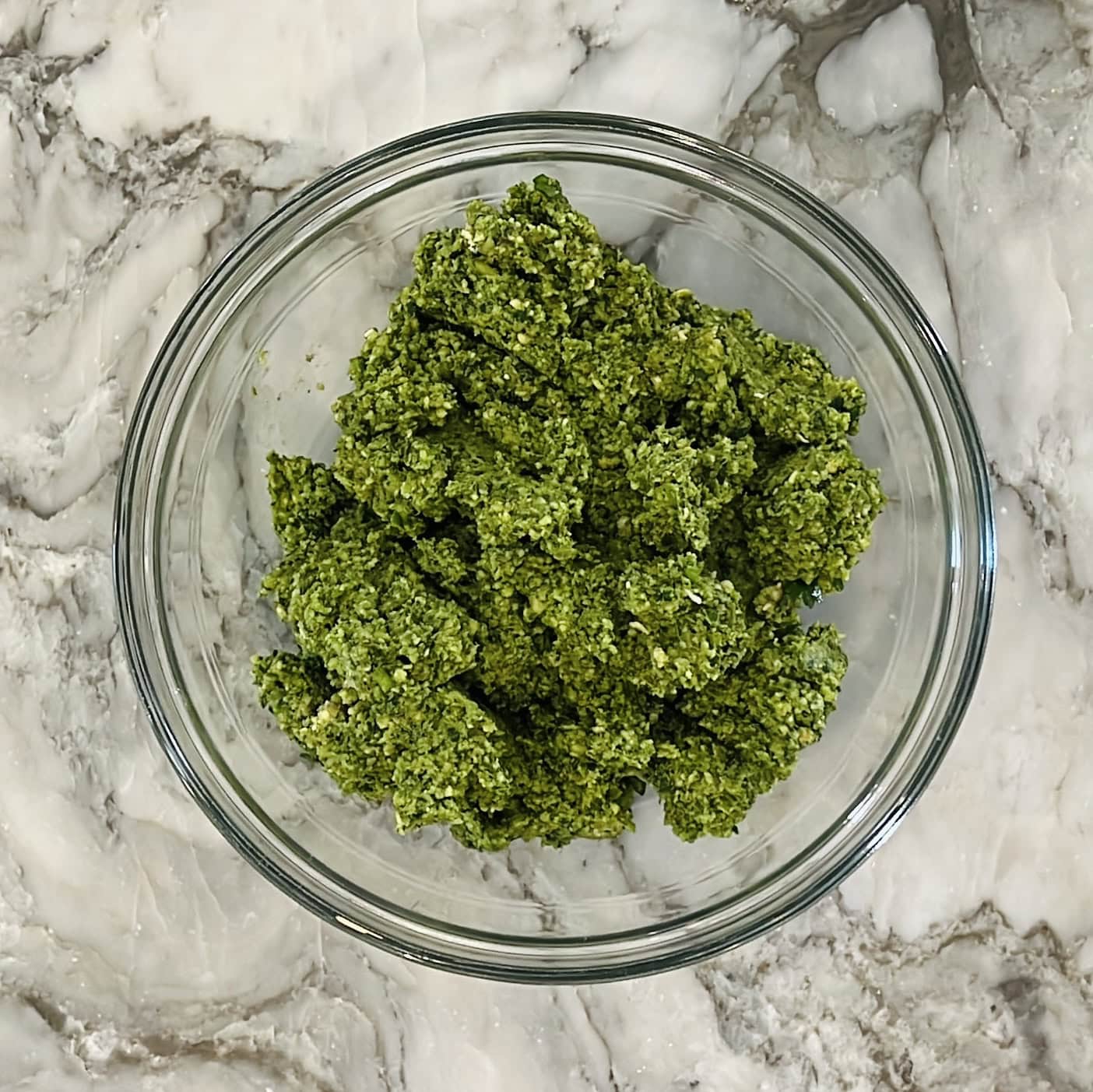 Moong tikki mixture in a glass bowl.
