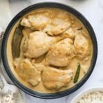 awadhi chicken korma in a serving bowl.